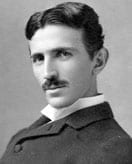 A black and white photo of nikola tesla.